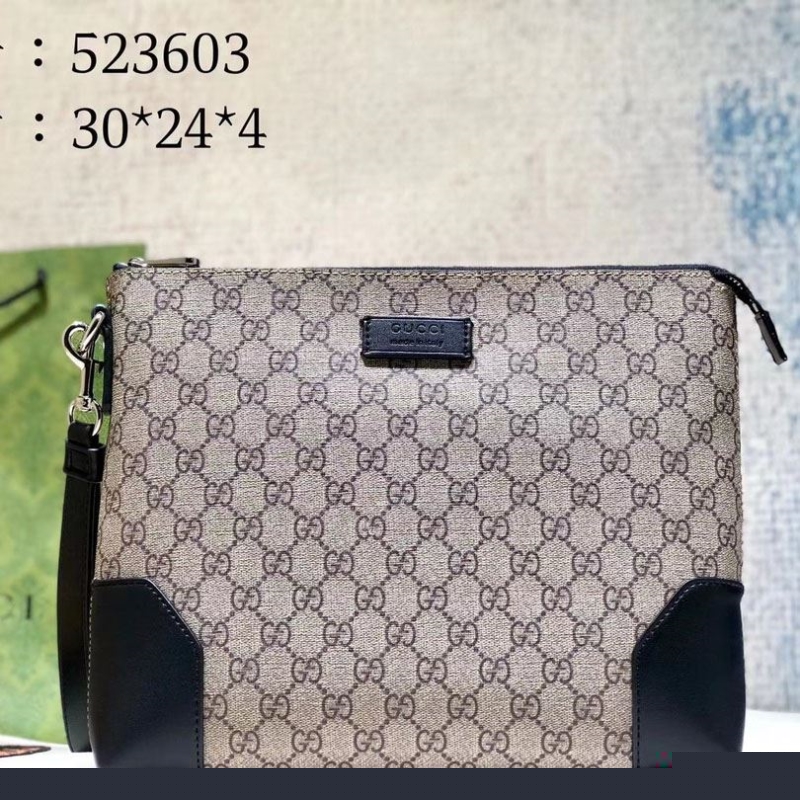 G*u*i clutch bags